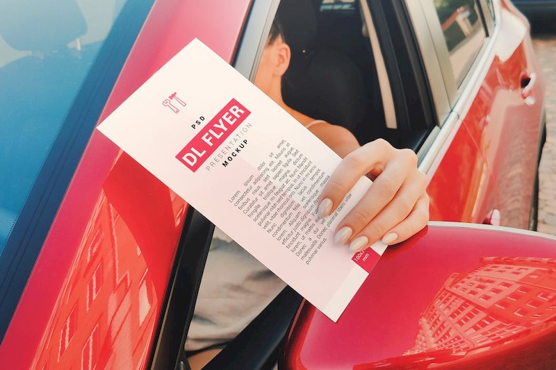 DL Flyer In Hand Mockup-5.jpg