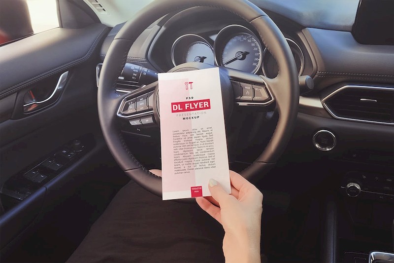 DL Flyer In Hand Mockup-1.jpg