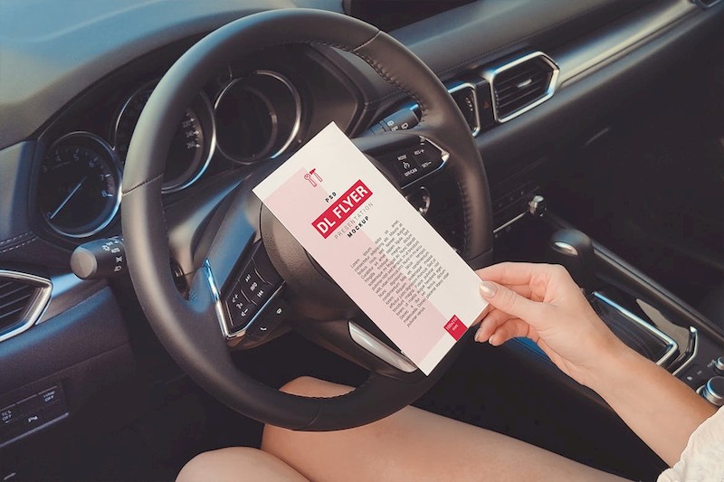 DL Flyer In Hand Mockup-3.jpg