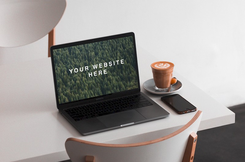 MacBook on Table Mockup-1.jpg